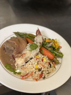 Bacon Wrapped Filet and Lobster Thermidor with couscous