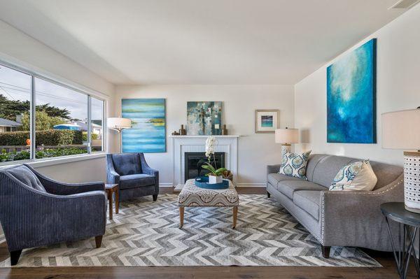 Living room that had new flooring, paint and staging at a recent listing.