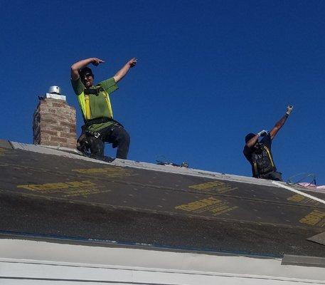 having some fun during their recent roofing job. Roof installation