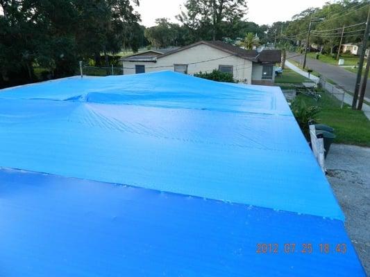 Roof tarp. Coastal Disaster Recovery, Inc.