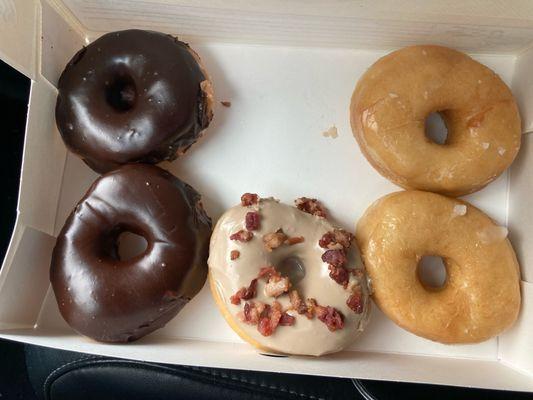 The Maple glazed with bacon sprinkles is my favorite.  Light & fluffy raised donuts - choc & glazed- just the right size.