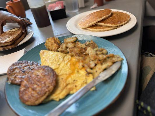 2 Cheese Eggs and 2 Pancakes but got 3( substitute toast for 1 extra pancake), Turkey Sausage, Home Fries