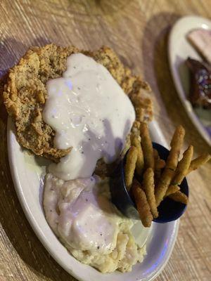 Chicken fried steak, mashed potatoes, fried green beans