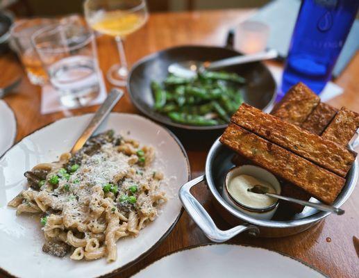 Mushroom pasta was wildly undercooked, could taste the raw flavor. Charred snap peas unremarkable. Hand-Cut BDT Triple Fries.