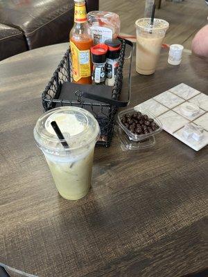 Iced Caramel macchiato and chocolate covered coffee beans