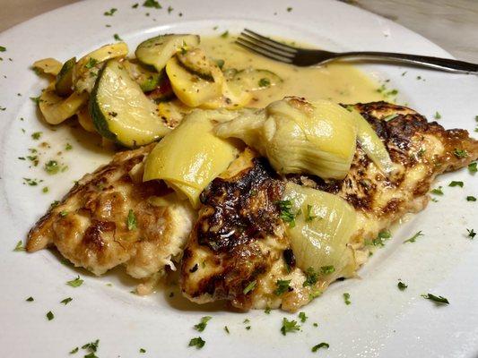 Chicken French with artichokes and pasta.