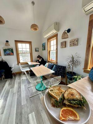 Cute well-designed interior dining space that's light & bright.