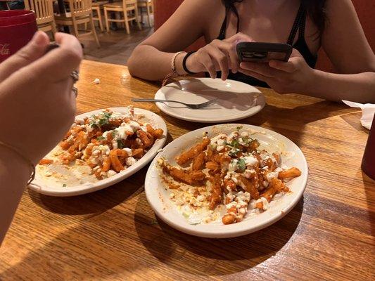 Tikka Masala Fries mid bite