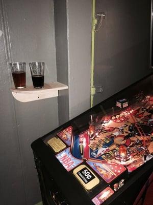 Handy shelves for your beer while playing pinball