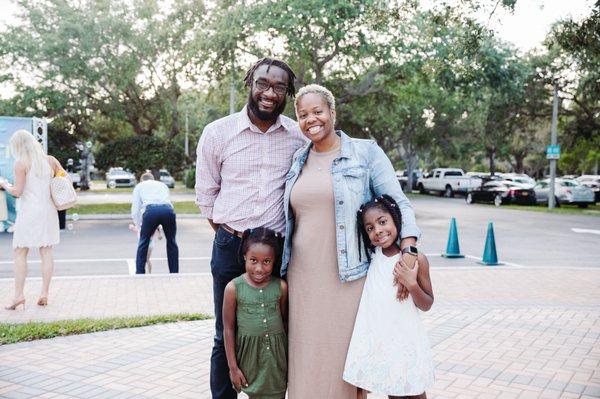 People taking a picture at Christ Fellowship Church in Palm Beach Gardens, FL