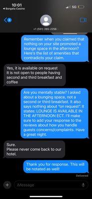 The owners response when they argued about the lounging space being locked in the afternoon, contradicting what the website states.