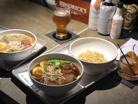 Our full order that night. Drinks at the bar, veggie broth (with meats) and pork broth. Ordered side of noodles