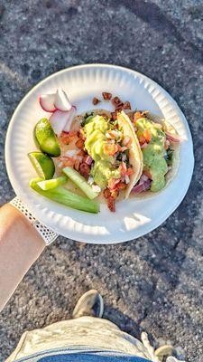 Flavorful taco de al pastor (marinated pork) on a freshly made flour tortilla and taco de lengua (tongue) on a corn tortilla.