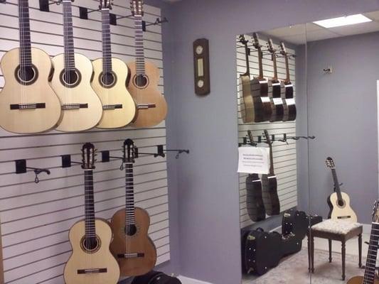 selection of fine guitars including ones made by local luthiers