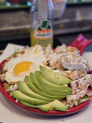 Green chilaquiles with grilled chicken