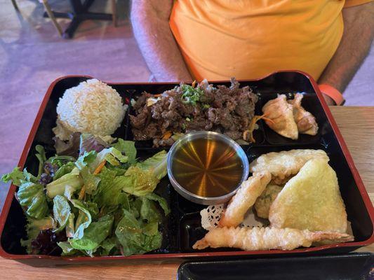 Bulgogi Lunch Special includes Mixed Tempura, Gyoza, Brown Rice and Salad.