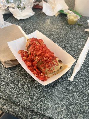 Pepper jack on a stick with hot Cheetos