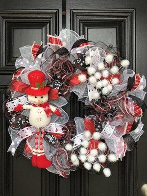 A wreath made by my wife. Many of the items on this wreath were purchased at Hobby Lobby.