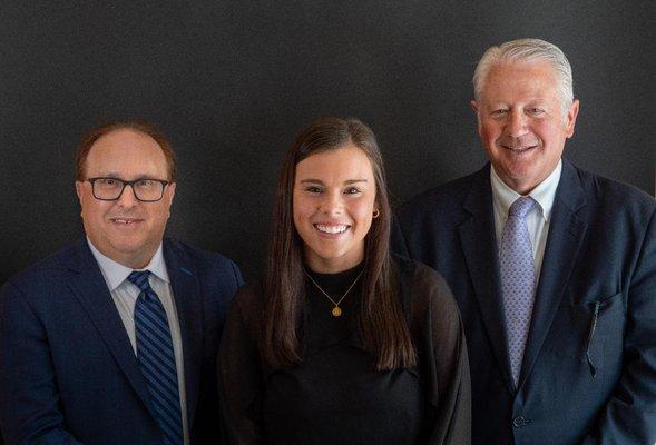 Partner Michael G Miller, Hailey Staunton and Hon. James M. McGing (former Supervising Judge)