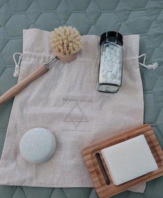 Rosemary/mint shampoo bar, dish block soap & holder, compostable dish scrubber, toothpaste tablets.