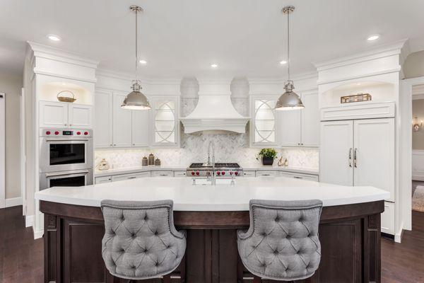 Elegant remodeled kitchen with centered island.