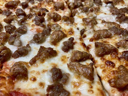 Beef and sausage pizza