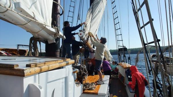 June 2013-Crew and passengers working hard (not me!)