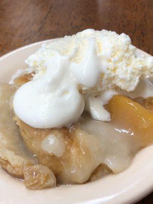 Really good peach cobbler with a little vanilla ice cream.