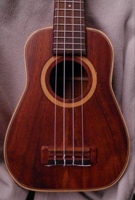 Front of my bell shaped, koa long neck soprano.  Great sound.  Sound is loud like a concert or tenor. Very mellow