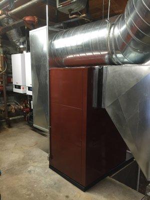 Dual wall hung high efficiency boilers and commercial dehumidification system installed in a local hotel.