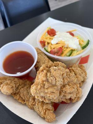 Chicken strips and a side salad