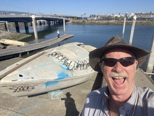 Getting junk boats out of the lake Merritt channel. All the pirate boats are now gone