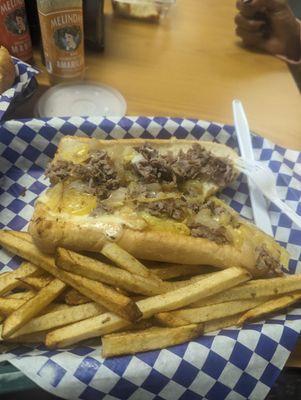 Half Philly Cheese Steak and seasoned fries