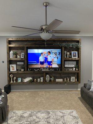 Custom shelf with 75" TV mounted