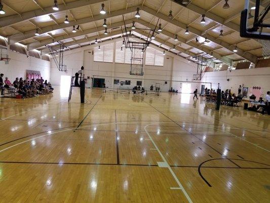 The wooden bleachers on the sides are gone. The floor has been renovated!