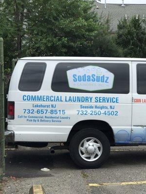 Their van advertising their laundry service for residential & commercial customers