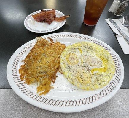 Eggs over medium, hash browns, & bacon w/ iced tea