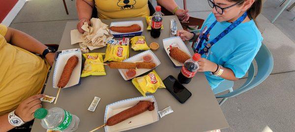 What you see is three classic corn dogs one pickle dog one mozzarella stick dog very good and delicious