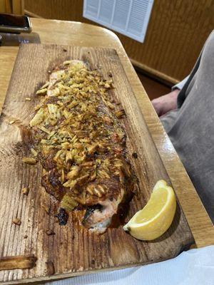 White fish dinner with baked potato and broccoli