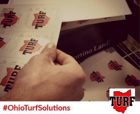 Our team member preparing our free coupon book today from Ohio Turf Solutions by messaging us your address! Stop in and check: www.ohioturfs