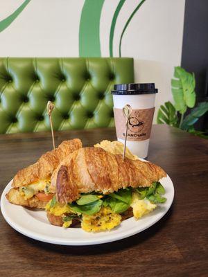 Breakfast croissant and latte