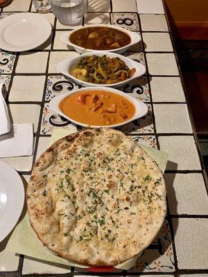 Garlic Naan, Chicken Tikka Masala, Sada Bhindi, Lamb Vindaloo.