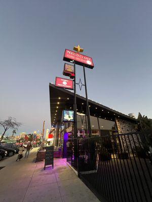 Outside. the tallest sign in hillcrest