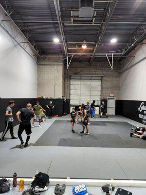 Adult/teens wrestling with Coach Richard Fimbres