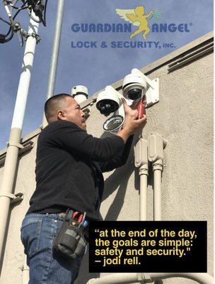 Installing security cameras GUARDIAN ANGEL technician