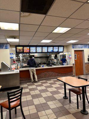 A look towards the counter - bathrooms are partially visible on the right of the frame.