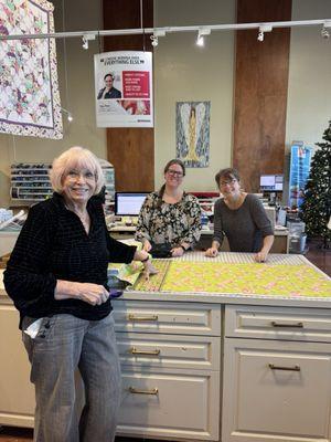 Patty, Grace and Peggy are ready to cut fabric or get you what you need at Going Batty. Check out the Bernina selection. Julie A