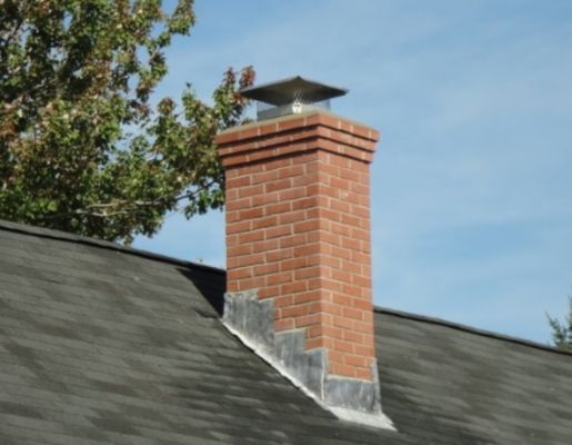 This is a 50-year-old chimney that we just recently prepared power washed repointed and rejoined it new liner and cap