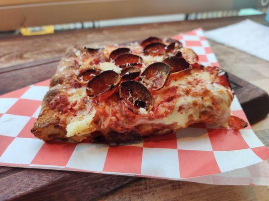 These pepperoni are experiencing what academics often refer to as "the curly crispies".