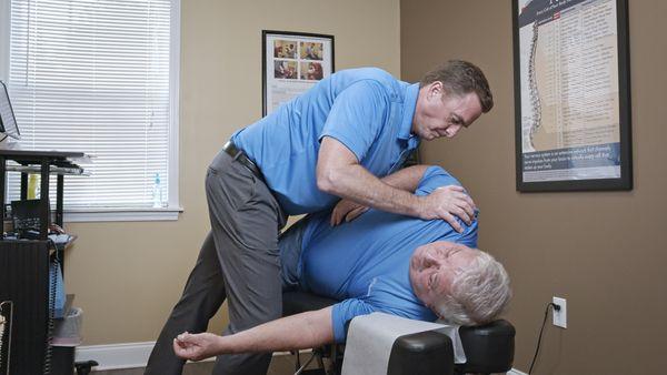 Dr. Stevens adjusting a patient.